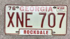 License Plate Vintage Georgia GA 1976 w/ 1982 Sticker Rockdale County XNE 707 picture