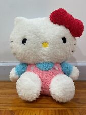 Sanrio Hello Kitty Animated Plush with pink suit and Red bow 12