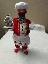 Black Santa Figurine Baker / Chef Decorating A Gingerbread House picture