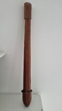 Wooden puzzle mallet. Wooden statue New caledonia picture