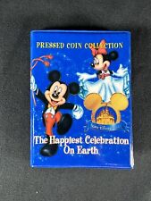 Disney pressed-squashed penny book Happiest Celebration on Earth picture