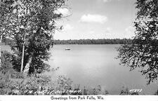 PARK FALLS WISCONSIN~A LONELY BOATMAN~1952 REAL PHOTO GREETINGS POSTCARD picture