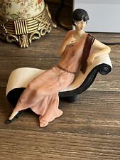 Lady Sitting In Lounge Chair Figurine picture