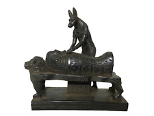 A rare statue of the ancient god Anubis mummifying the dead for the afterlife picture