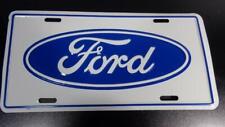 FORD BLUE OVAL LOGO ON WHITE ALUMINUM LICENSE PLATE NEVER DISPLAYED, NICE PLATE picture
