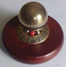 vintage stock market decision maker spin brass wood paperweight ball wall street picture