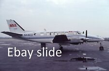 Orig 1980 35mm Kodachrome slide - Mississippi Valley Beech 99 N44KX at unk. arpt picture