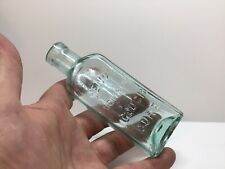 Small Antique Aqua Veno's Lightning Cough Cure Medicine Bottle. picture