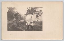 RPPC Man with Adorable Child in Yard c1907 Real Photo Postcard I28 picture
