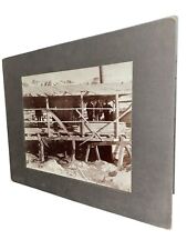 Early logging yard photograph with lumber and workers picture
