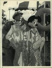 1988 Press Photo Sir Elton John with Minnie Mouse in 