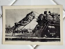c1930’s F.D. Conrad Exaggerated Grasshopper Train Hold Up RPPC Photo Postcard picture