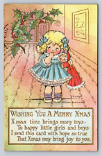 1908 Artist M.G. Hayes Christmas PC Blue Bow Blonde Girl Purple Socks Baby Doll picture