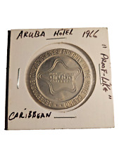 VINTAGE $1 GAMING TOKEN 1966 ARUBA CARIBBEAN HOTEL & CASINO picture