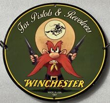 RARE WINCHESTER PISTOLS AND REVOLVERS 1967 PORCELAIN ENAMEL SIGN. picture