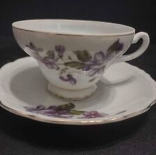 Beautiful purple violet Porcelain teacup and saucer picture