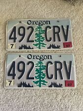 2 Matching Vintage Oregon License Plates Pair TREE Design. Man Cave. Bar. picture