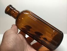 Antique Amber Double Poison Embossed Round Fluted Poison Bottle. picture