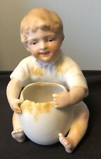 Antique German Bisque Piano Dirty Baby Holding Egg picture