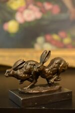 Signed: NICK, Bronze statue Two running rabbits Bronze Sculpture picture