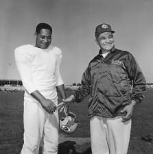 Green Bay Packer defensive back Em Tunnell shakes hands coach - 1961 Old Photo picture
