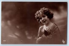 Pretty Little Girl Postcard RPPC Photo Curly Hair With Flowers Studio c1910's picture