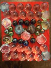 Lot of glowy glass shells and balls picture