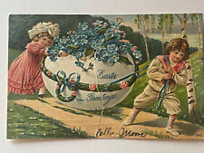 Vintage EASTER GREETINGS Boy & Girl Pulling Egg Flowers Trees 1908 Embossed Nice picture