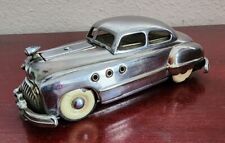 VINTAGE BUICK W/SPINNING WHEELS CHROME LIGHTER. OCCUPIED JAPAN. 4.7