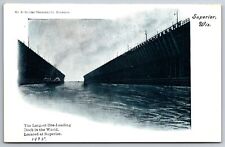 Superior Wisconsin~Looking Through Ore Loading Dock~c1910 B&W Postcard picture
