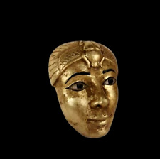 A rare ancient Egyptian gold mask with a Pharaonic scarab beetle statue, BC picture