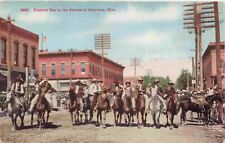 Cowboys on Horseback in Streets of Cheyenne Wyoming Vintage c1912 Postcard picture