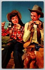Postcard Cowboy & Cowgirl Rolling a Cigarette picture