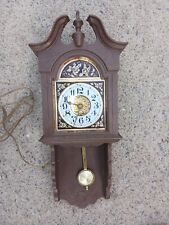 Rare Vintage Spartus Electric Pendulum Wall Clock Wood Look Brown Plastic WORKS picture