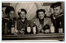 c1940's WWII Sailors Drinking Whiskey With Dates RPPC Photo Vintage Postcard picture