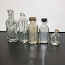 LOT OF 5 VINTAGE ANTIQUE APOTHECARY GLASS BOTTLES SIZES VARY 1 w/CORK 2 w/CAPS picture