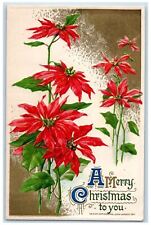 c1910's Christmas Poinsettia Flowers John Winsch Artist Signed Embossed Postcard picture