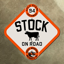 Colorado Rocky Mountain Motorists state highway 94 stock warning road sign cow picture