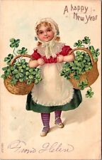 A Happy New Year Postcard Girl Carrying Two Baskets of Four Leaf Clovers picture