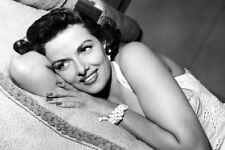 JANE RUSSELL LYING ON COUCH SLEEVELESS DRESS 24x36 inch Poster picture