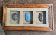 Framed artifacts, 15” x 8”/ two masks and one shield. Very Good Condition  picture