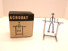 Vintage Metal Kinetic Acrobat Swinging on a Bar Sculpture in 2 PC picture
