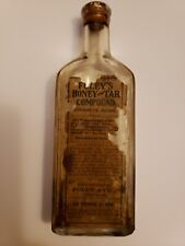 Embossed 1890's bottle of Foley's Honey and Tar Compound /Fully intact label picture