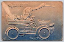 eStampsNet - Stork Drives Car w/ Twin Babies in Back Seat Raised Embossed 1908 picture