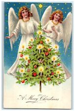c1910's Christmas Tree Floating Angels Candle Lights Embossed Antique Postcard picture
