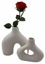Two beautiful white stone looking vases (T) picture