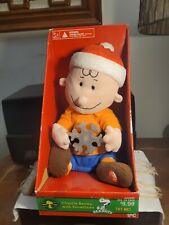 Gemmy Peanuts Charlie Brown with Light Up Snowflake Plush Musical Toy picture