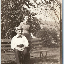 c1910s Old Married Couple Outdoors RPPC Gentleman Man Sits Bench Real Photo A212 picture