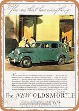 METAL SIGN - 1935 Oldsmobile Six 4 Door Sedan the Car That Has Everything picture