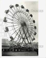 1987 Press Photo Ferris Wheel being assembled by workers at the York County Fair picture